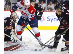 The Calgary Hitmen will square off with the Lethbridge Hurricanes in the first round of WHL playoffs. Postmedia file photo