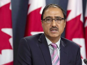 Natural Resources Minister Amarjeet Sohi speaks about the government's plan for the Trans Mountain Expansion Project during a news conference in Ottawa on October 3, 2018. Canada's natural resources minister says the government will not be "cutting corners" in order to speed up the full review process for the Trans Mountain pipeline.