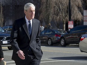 Special Counsel Robert Mueller walks to his car after attending services at St. John's Episcopal Church, across from the White House, in Washington, Sunday, March 24, 2019. Mueller closed his long and contentious Russia investigation with no new charges, ending the probe that has cast a dark shadow over Donald Trump's presidency.