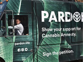 Event manager David Duarte with the PARDON truck parked along Jasper Avenue to gather signatures for their quest of 10,000 to bring to Parliament and they'll be here for two days in Edmonton, April 5, 2019. Cannabis producer DOJA in B.C., has partnered with Cannabis Amnesty to create PARDON, a signature-driven awareness campaign that encourages Parliament to immediately enact legislation that furthers the pardon by granting expungements to all individuals with minor cannabis convictions. Ed Kaiser/Postmedia