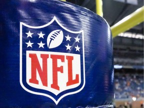 This Aug. 9, 2014 file photo shows an NFL logo on a goal post padding before a preseason NFL football game between the Detroit Lions and the Cleveland Browns at Ford Field in Detroit.