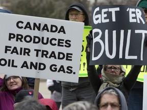 Protesters in favour of the Trans Mountain pipeline expansion protest outside the Alberta Legislature in Edmonton on Thursday April 12, 2018.