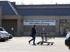 A Fort Mac Strong poster is still visible at the Safeway in downtown Fort McMurray on Tuesday, April 2, 2019.