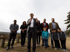 Alberta Party Leader Stephen Mandel (left) speaks about his party's K-12 education funding plan during a press conference overlooking MacKinnon Ravine Park in Edmonton on Thursday, April 11, 2019.