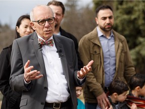 Alberta Party Leader Stephen Mandel (left) speaks about his party's K-12 education funding plan during a press conference overlooking MacKinnon Ravine Park in Edmonton on Thursday, April 11, 2019.