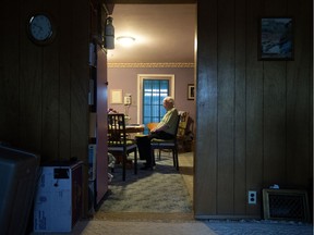 Eric Bishop sits in the kitchen of his east Edmonton home, Thursday April 11, 2019. Eric and his wife Jean Bishop are about to lose their home of 52 years to forecloser. Realtor Ken Morrison has started a gofundme to save the couples' home.