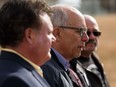 Alberta Party Leader Stephen Mandel, second from left, speaks about a robocall that seemingly showed his incorrect support for a UCP government sent to Bob Wispinski, right, during a news conference with Alberta Party candidates Dave Quest, left, and Marvin Olsen outside the Federal Building in Edmonton on Sunday, April 14, 2019.