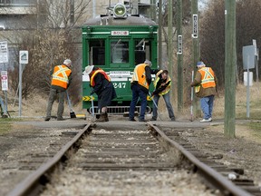 Crews work on the High Level Bridge Streetcar rail line near 107 Street south of Saskatchewan Drive, in Edmonton Monday April 15, 2019. Photo by David Bloom
