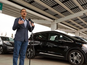 Canada's Natural Resources Minister Amarjeet Sohi speaks about Budget 2019 funding for zero-emissions vehicles during an announcement at a FLO charging station at Londonderry Mall in Edmonton, on Wednesday, April 24, 2019.