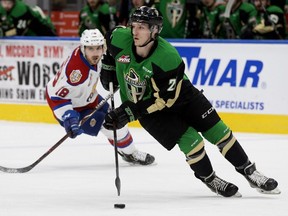 The Edmonton Oil Kings' Vince Loschiavo (18) chases the Prince Albert Raiders' Aliaksei Protas (21) during Game 4 of the WHL Eastern Conference Championship first period action at Rogers Place, in Edmonton Wednesday April 24, 2019.