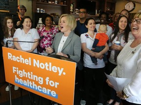 NDP leader Rachel Notley is supported by nurses during a campaign stop at a southwest Calgary coffee shop on Thursday April 11, 2019. Gavin Young/Postmedia