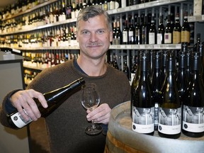 Canadian wine producer Tyler Harlton (TH Wines) with some of the wine that he makes at his winery in Summerland, BC.