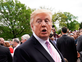 U.S. President Donald Trump speaks to reporters during the annual White House Easter Egg Roll on the South Lawn of the White House in Washington on April 22, 2019.