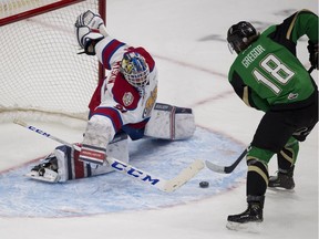 Edmonton Oil Kings goaltender Dylan Myskiw (31) makes a save on Prince Albert Raiders Noah Gregor (18) during first period WHL playoff action on Sunday, April 28, 2019, in Edmonton .
