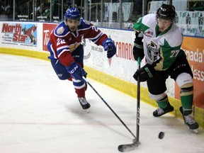 Edmonton Oil Kings defenceman Matthew Robertson chases Prince Albert Raiders centre Parker Kelly Saturday, April 20, 2019, during first-period action of Game 2 of the WHL Eastern Conference final at Art Hauser Centre in Prince Albert, Sask.