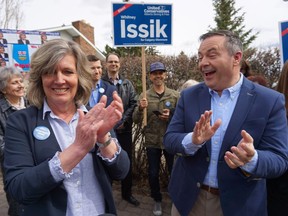 United Conservative Party Leader Jason Kenney with UCP Calgary-Glenmore candidate Whitney Issik, left, as the two prepare to door knock in Issik’s riding during the Alberta election campaign on Tuesday, April 9, 2019.