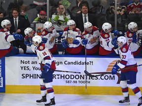 Edmonton Oil Kings bench celebrate Quinn Benjafield's (14) goal against the Calgary Hitmen during WHL second round playoff action at Rogers Place in Edmonton, April 7, 2019.