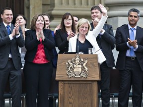 Premier Rachel Notley gives a speech during the swearing-in ceremony for the NDP government cabinet at the Alberta legislature on May 24, 2015. The election saw a huge number of new MLAs elected, with 71 of those elected in 2015 new to the job.