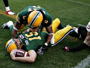 Edmonton Eskimos Ricky Ray and Fred Stamps celebrate Ricky Ray's touchdown against the Calgary Stampeders during first half action at Commonwealth Stadium on Thursday night.