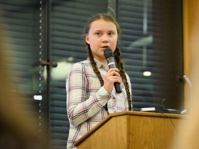 Swedish environmental campaigner Greta Thunberg addresses politicians, media and guests with the Houses of Parliament on April 23, 2019 in London, England. Her visit coincides with the ongoing "Extinction Rebellion" protests across London, which have seen days of disruption to roads and transport systems, in a bid to highlight the dangers of climate change.