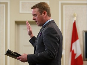 Tyler Shandro is sworn in as Minister of Health during the swearing in of Premier Jason Kenney's government at Government House in Edmonton, on Tuesday, April 30, 2019. Photo by Ian Kucerak/Postmedia