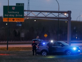 Edmonton Police Service officers investigate after a suspicious death was reported near Yellowhead Trail and 184 Street in Edmonton, on Wednesday, May 15, 2019.
