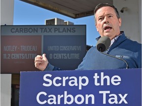 United Conservative Leader Jason Kenney respond to the federal carbon tax, which takes effect Monday during a news conference at the Lymburn Esso in west Edmonton, April 1, 2019.