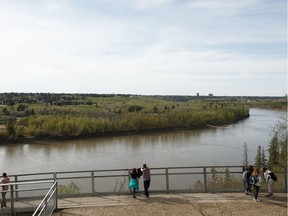 Visitors look out over the river valley at Keillor Point Viewing Area a.k.a The End of the World in Edmonton, on Friday, May 17, 2019.