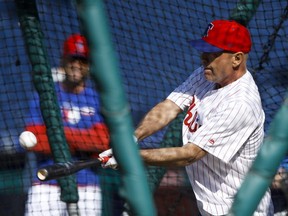 Actor Bruce Willis takes batting practice before a baseball game between the Philadelphia Phillies and the Milwaukee Brewers on May 15, 2019, in Philadelphia.