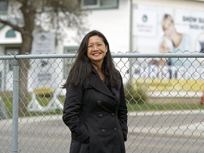 Karen Lee, Housing for Health project director, is seen across the street from the Southwoods pilot project at 9430 67 Ave. on Tuesday.