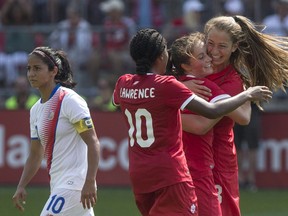 Canada's Jordyn Huitema (right) celebrates with Ashley Lawrence (10) and Jessie Fleming after scoring her second goal and her country's sixth as Costa Rica's Shirley Cruz walks by during second half International women's soccer action in Toronto on Sunday, June 11, 2017. Canadian teenage forward Jordyn Huitema has joined Paris Saint-Germain on a four-year deal.