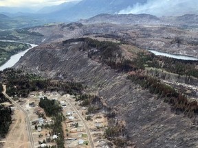 Damage from a wildfire that ripped through Tahltan Nation territory in Telegraph Creek, B.C., is seen in this 2018 handout photo. BC Wildfire Service crews are arriving in northwestern British Columbia as drought grips the region and fire danger ratings soar along with the temperature. The wildfire service is setting up a 150-person camp in the Dease Lake area, not in response to any specific blaze, but because the service expects potential new wildfire activity due to the parched conditions.