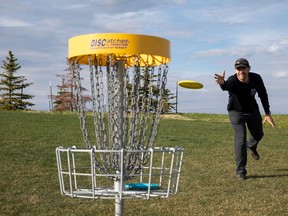 Andrew Stevens enjoys playing the new championship disc golf course developed at The Hills at Charlesworth. Stevens is a member of the Edmonton Disc Golf Association, which meets and plays at the new course every Tuesday. (Photo: Codie McLachlan/Postmedia)