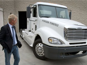 Jens Meier, chief executive officer of the Hamburg Port Authority, reviews the Vision Industries Corp. Tyrano hydrogen-powered class 8 truck prototype in El Segundo, California, U.S. File photo.