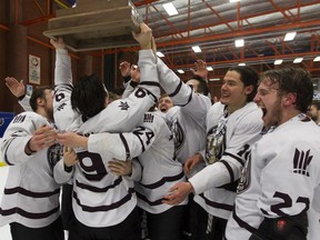 The MacEwan Griffins celebrate winning Game 3 and the Alberta Colleges Athletic Conference men's hockey final versus the NAIT Ooks at Northern Alberta Institute of Technology in Edmonton, on Sunday, March 18, 2018.