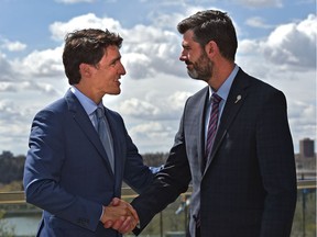 Prime Minister Justin Trudeau meets with Edmonton Mayor Don Iveson before delivering remarks to highlight the Municipal Infrastructure Top-Up at the Edmonton Convention Centre, May 10, 2019.