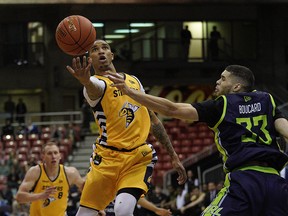 Niagara River Lions Guillaume Boucard (right) defends against Edmonton Stingers Xavier Moon (left) during Canadian Elite Basketball League (CEBL) game action at the Edmonton Expo Centre on Friday May 10, 2019. (PHOTO BY LARRY WONG/POSTMEDIA)
