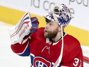 Canadiens goalie Antti Niemi watches a replay on giant screen at the Bell Centre during first period of NHL game against the Florida Panthers in Montreal on Jan. 15, 2019.