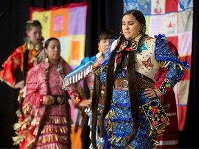 Jingle Dancers perform at the closing ceremony marking the conclusion of the National Inquiry into Missing and Murdered Indigenous Women and Girls at the Museum of History in Gatineau, Quebec on June 3, 2019.
