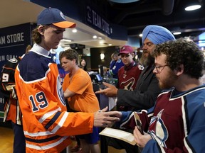 VANCOUVER, BRITISH COLUMBIA - JUNE 22: Raphael Lavoie signs his autograph after being selected 38th overall by the Edmonton Oilers during the 2019 NHL Draft at Rogers Arena on June 22, 2019 in Vancouver, Canada.