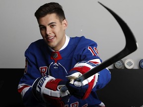 VANCOUVER, BRITISH COLUMBIA - JUNE 22: Matthew Robertson poses after being selected 49th overall by the New York Rangers during the 2019 NHL Draft at Rogers Arena on June 22, 2019 in Vancouver, Canada.