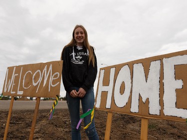 Portia Giesbrecht, 14, made a Welcome Home sign that she installed with her grandmother off Highway 58 to welcome residents returning to High Level, Alberta, after being evacuated due to the Chuckegg Creek wildfire on Monday, June 3, 2019.