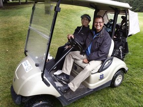 Ed Stelmach and his wife Marie Stelmach at the 11th annual Tee Up for Tots golf game in 2010.