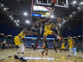 Edmonton Stingers guard Deondre Parks leaps into the air to shoot the ball during the game at SaskTel Centre in Saskatoon, Sk on Thursday, June 6, 2019.