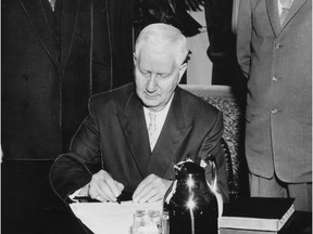 Percy Page signing on as Lieutenant Governor of Alberta
