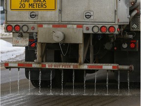 A City of Edmonton truck applies a calcium chloride anti-icing solution to the road in February 2018.