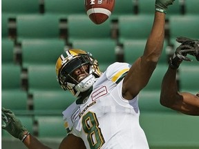 Edmonton Eskimos receiver Kenny Stafford (left) and B.C. Lions' Marloshawn Franklin battle for the ball during a Canadian Football League pre-season game in Edmonton on Sunday, May 26, 2019.