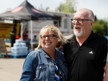 High Level evacuees Shirley and Garry Murphy celebrate hearing that they can return to their home on Monday at an evacuation centre in the town of Slave Lake, on Sunday, June 2, 2019.