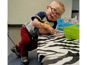 Three-year-old Eric Purves works on some arts and crafts during the 12th annual Dreamnight at the Edmonton Valley Zoo on Friday June 7, 2019.