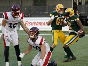 Edmonton Eskimos CJ Gable (right) celebrates his touchdown with team mate Greg Ellingson during CFL game action against the Montreal Alouettes at Commonwealth Stadium in Edmonton on Friday June 14, 2019.